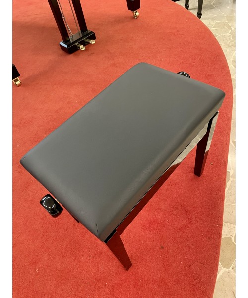 Glossy black piano bench