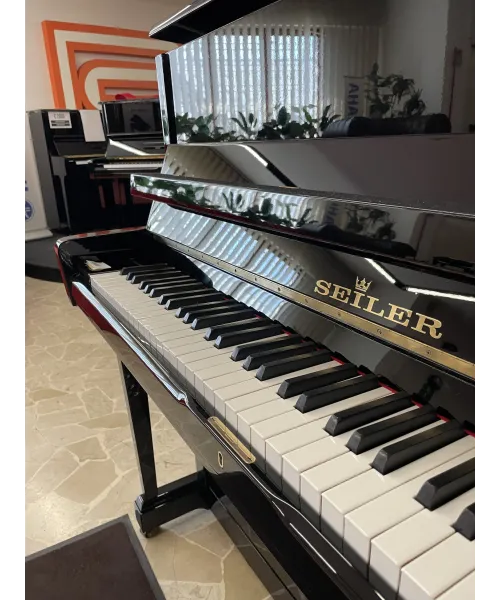 Glossy black vertical piano