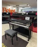 Glossy black vertical piano