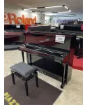 Glossy black vertical piano