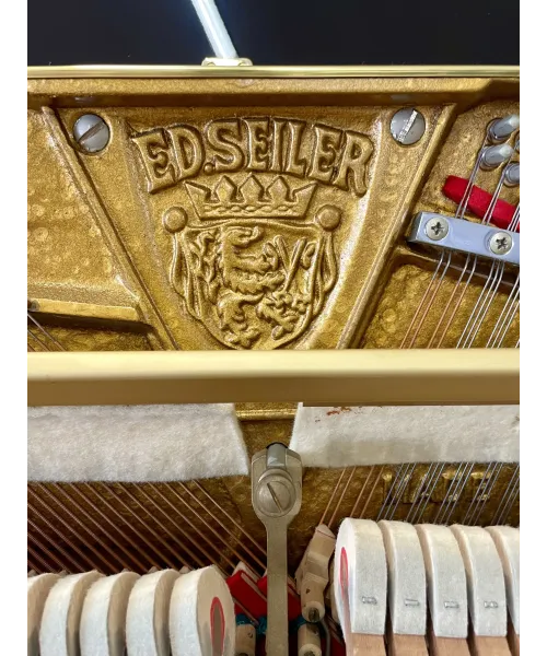 Glossy black vertical piano