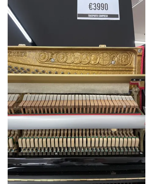 Glossy black vertical piano