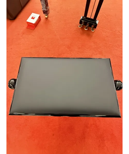 Glossy black piano bench