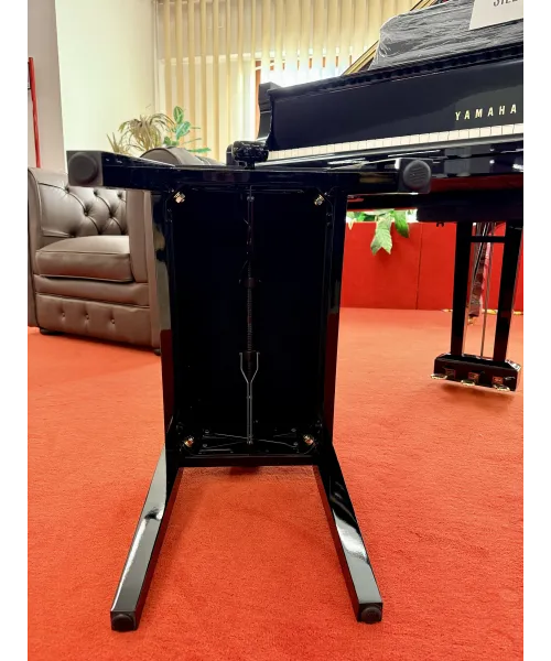 Glossy black piano bench