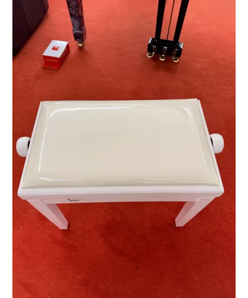 Glossy white piano bench